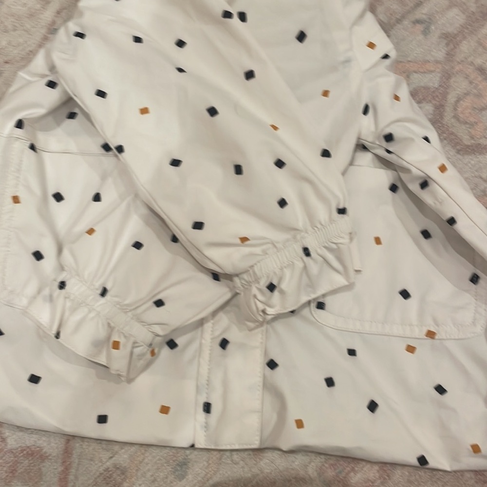 Miles Raincoat in white black and mustard yellow confetti pieces - Picture 2 of 5